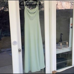 Gorgeous sage green bridesmaid dress. Spaghetti straps and slit.